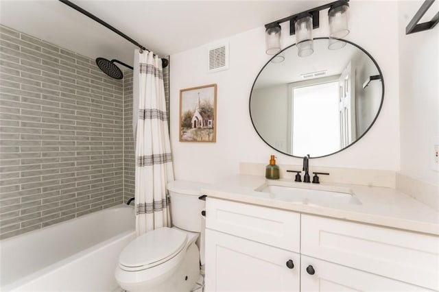 bathroom with vanity, shower / bath combo with shower curtain, toilet, and visible vents