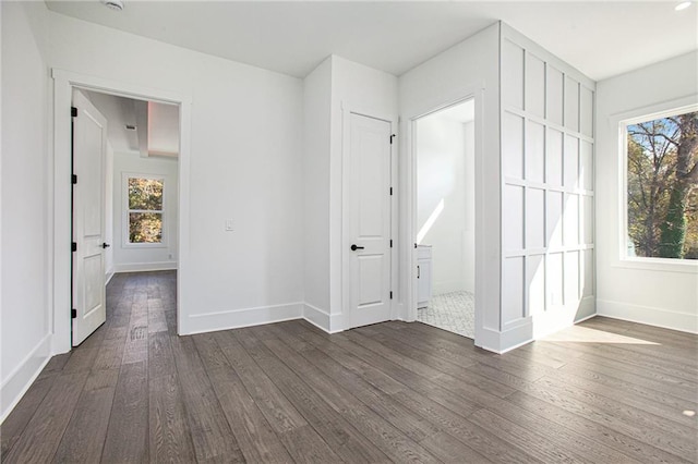 empty room featuring dark hardwood / wood-style floors