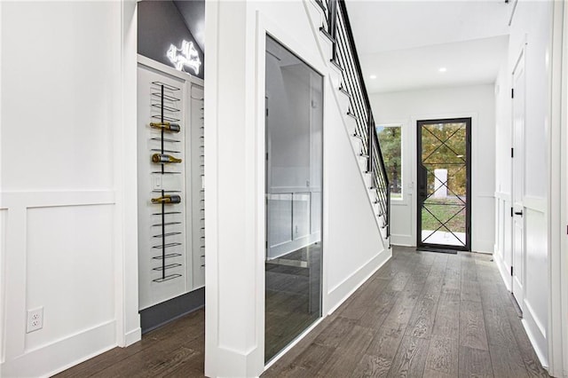 interior space with dark hardwood / wood-style flooring