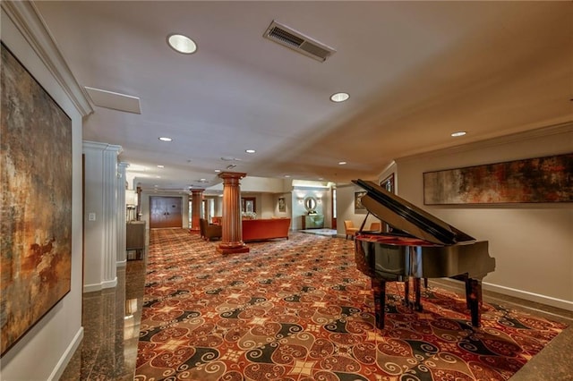 misc room featuring decorative columns