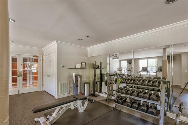 workout area with crown molding