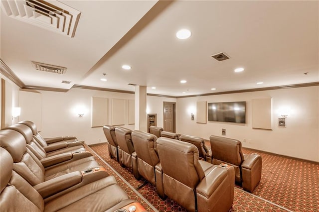 cinema room featuring crown molding and carpet flooring