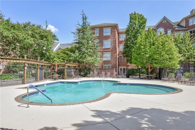 view of pool featuring a patio