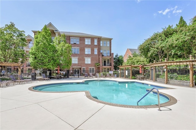 view of pool featuring a patio