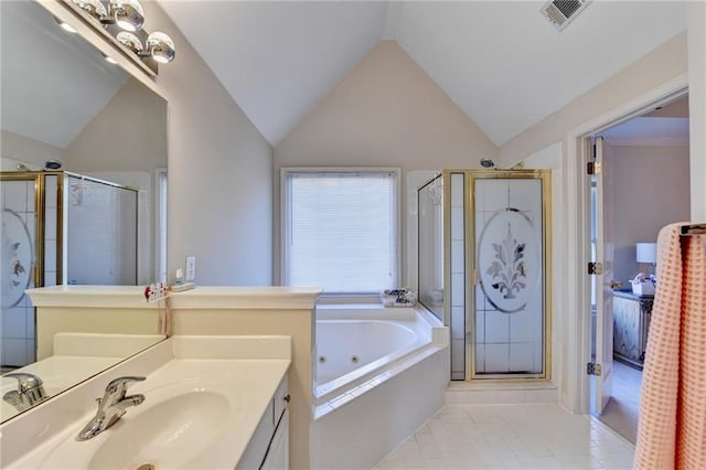 bathroom featuring vanity, shower with separate bathtub, and vaulted ceiling