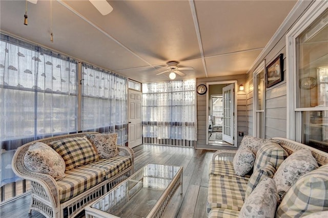 sunroom / solarium with ceiling fan