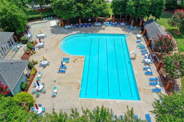 view of swimming pool featuring a patio area