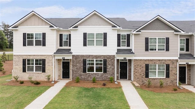 364 Sound Cir, Stockbridge, GA 30281 - view of front facade with brick siding and a front yard