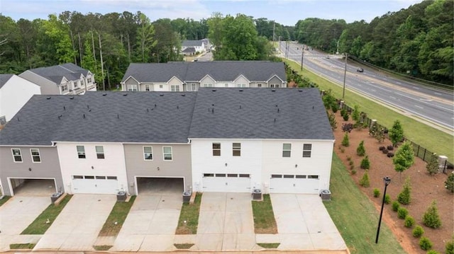 364 Sound Cir, Stockbridge, GA 30281 - aerial view of property and surrounding area featuring a forest