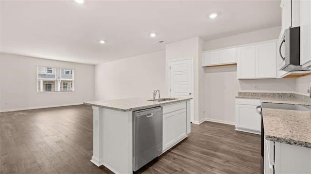 364 Sound Cir, Stockbridge, GA 30281 - kitchen with stainless steel appliances, dark wood finished floors, white cabinetry, and recessed lighting