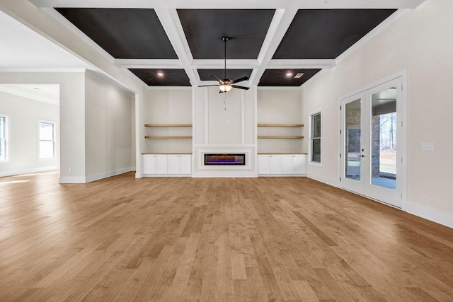 125 Drummond Pl, Covington, GA 30014 - unfurnished living room featuring coffered ceiling, ceiling fan, ornamental molding, baseboards, and built in features