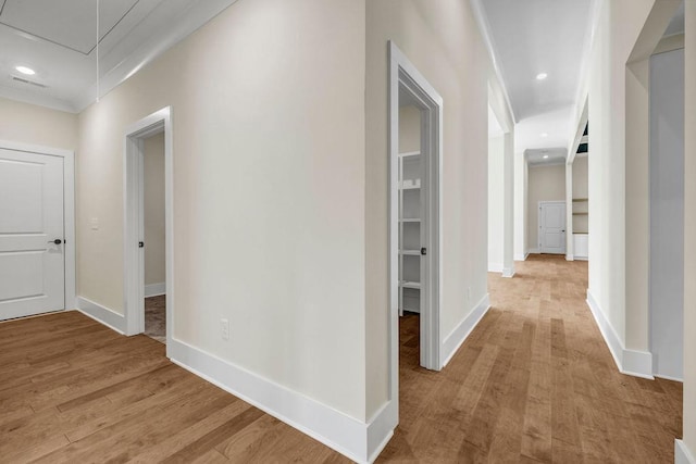 125 Drummond Pl, Covington, GA 30014 - corridor featuring attic access, light wood-style floors, baseboards, ornamental molding, and recessed lighting