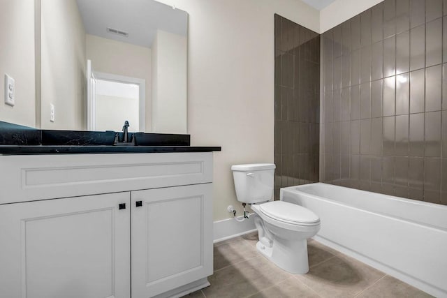 125 Drummond Pl, Covington, GA 30014 - full bath featuring toilet, tile patterned flooring, vanity, baseboards, and bathtub / shower combination