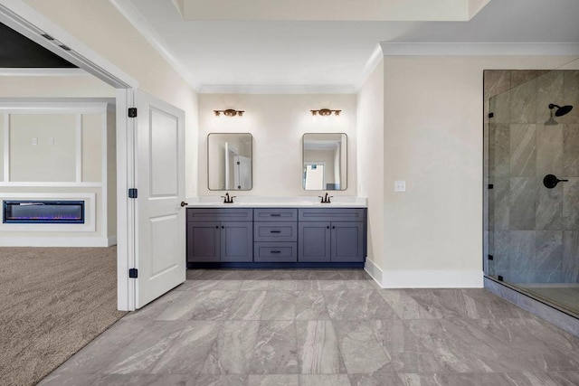 125 Drummond Pl, Covington, GA 30014 - full bathroom featuring a shower stall, baseboards, double vanity, ornamental molding, and a glass covered fireplace