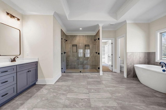 125 Drummond Pl, Covington, GA 30014 - bathroom with a shower stall, marble finish floors, a soaking tub, vanity, and crown molding