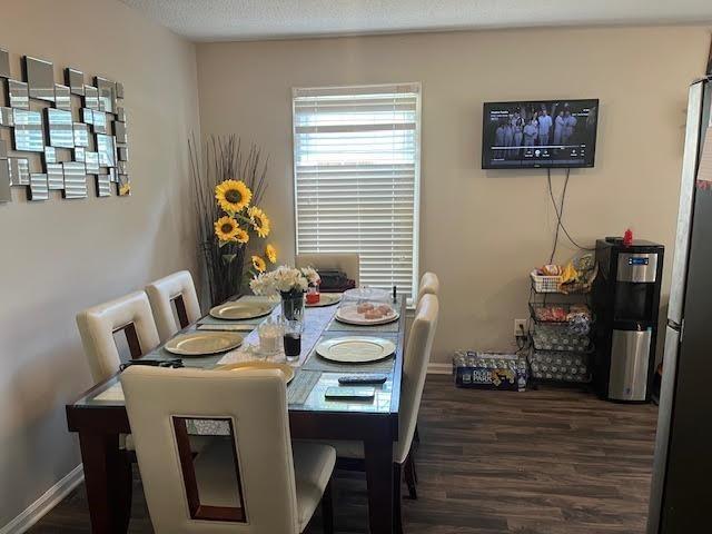 231 Forest Pl, Lawrenceville, GA 30046 - dining room with wood finished floors and baseboards