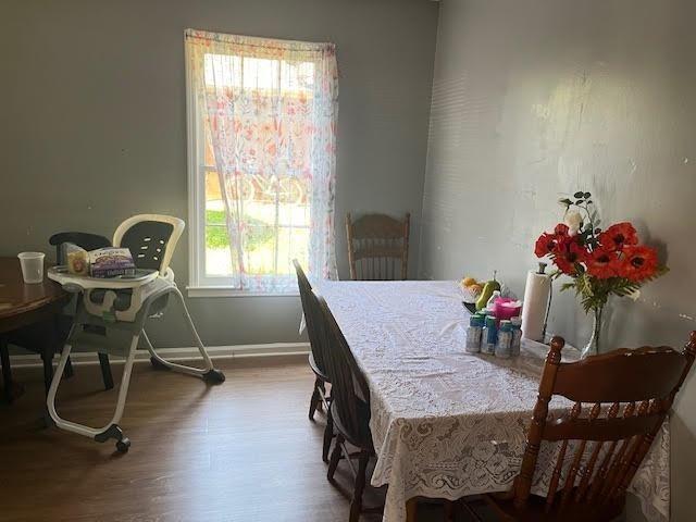 231 Forest Pl, Lawrenceville, GA 30046 - dining space featuring wood finished floors and baseboards