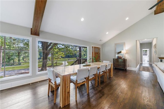 dining area with vaulted ceiling with beams and dark hardwood / wood-style floors