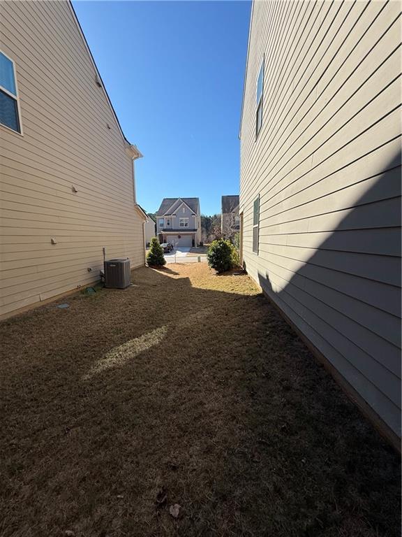 view of yard featuring cooling unit