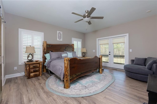 bedroom featuring light wood-type flooring, french doors, access to exterior, and a ceiling fan