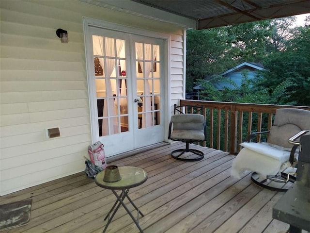 wooden deck featuring french doors