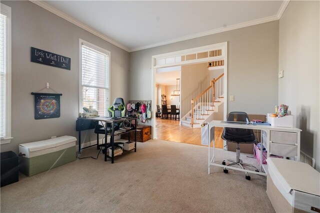 carpeted office space with ornamental molding