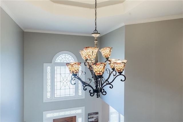 room details featuring crown molding and a chandelier