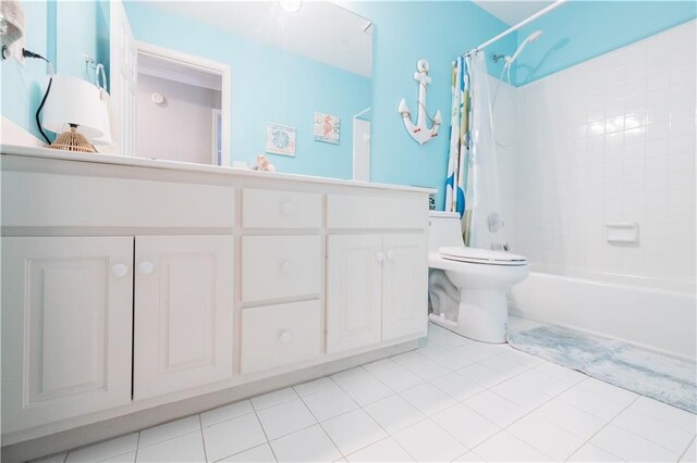 full bathroom with toilet, vanity, shower / bath combo, and tile patterned flooring