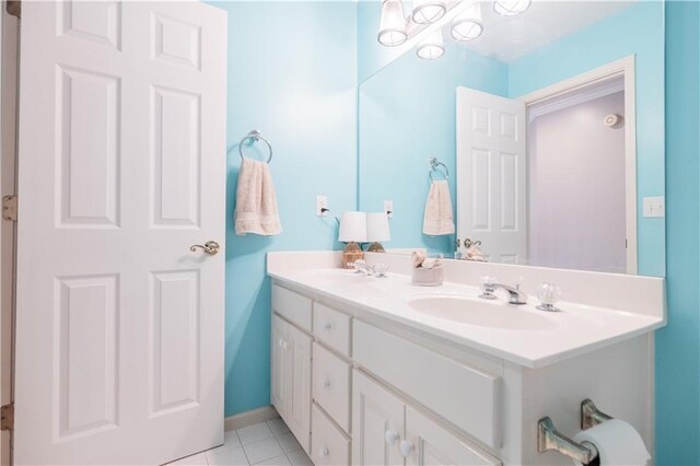 bathroom featuring tile patterned floors and vanity