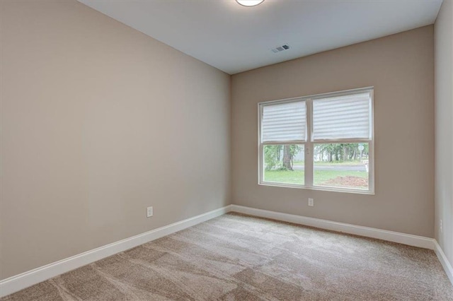 4230 Moore Rd, Conley, GA 30288 - spare room featuring carpet flooring and baseboards