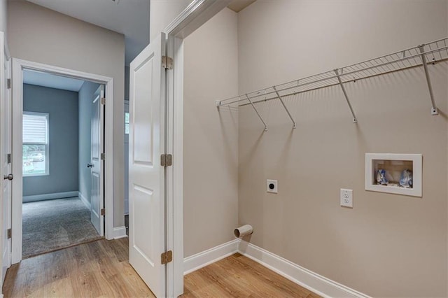 4230 Moore Rd, Conley, GA 30288 - washroom featuring hookup for an electric dryer, light wood-style floors, and hookup for a washing machine