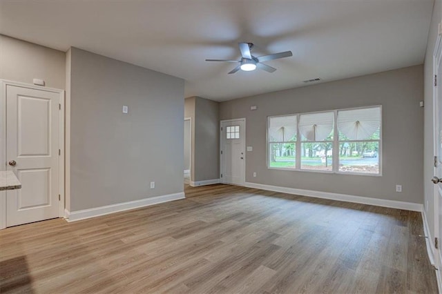 4230 Moore Rd, Conley, GA 30288 - spare room featuring light wood finished floors and a ceiling fan
