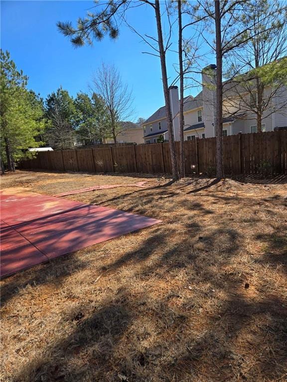 view of yard featuring fence