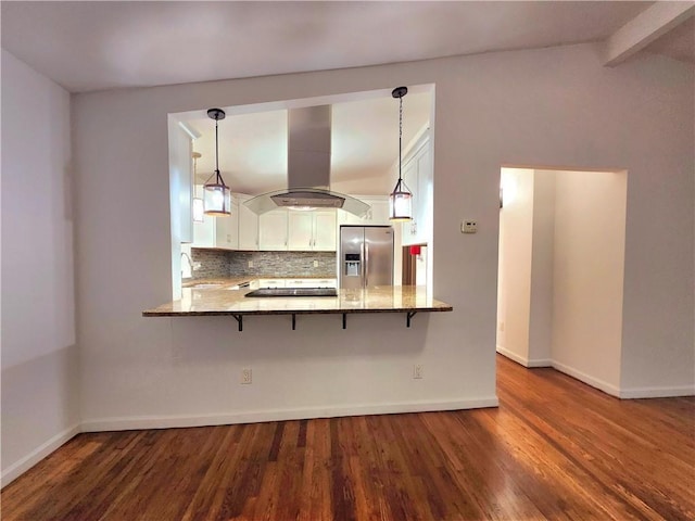 kitchen featuring white cabinetry, stainless steel refrigerator with ice dispenser, island exhaust hood, decorative backsplash, and kitchen peninsula