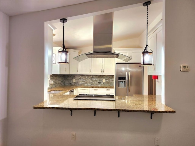 kitchen featuring decorative light fixtures, island exhaust hood, white cabinets, and stainless steel refrigerator with ice dispenser