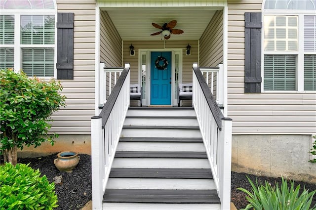 doorway to property with a ceiling fan