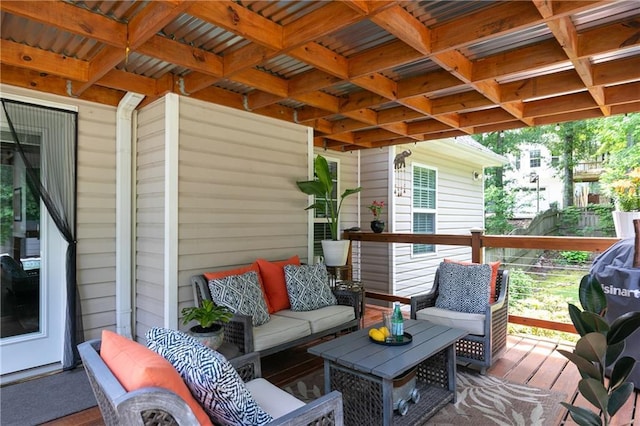 wooden terrace featuring an outdoor hangout area