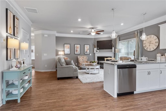 kitchen featuring dishwasher, white cabinetry, dark hardwood / wood-style flooring, and light stone countertops