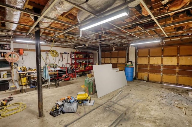 garage with a workshop area