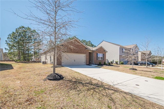 view of front facade featuring brick siding, an attached garage, driveway, and a front lawn