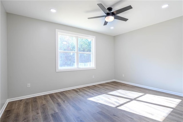 empty room featuring ceiling fan and wood-type flooring