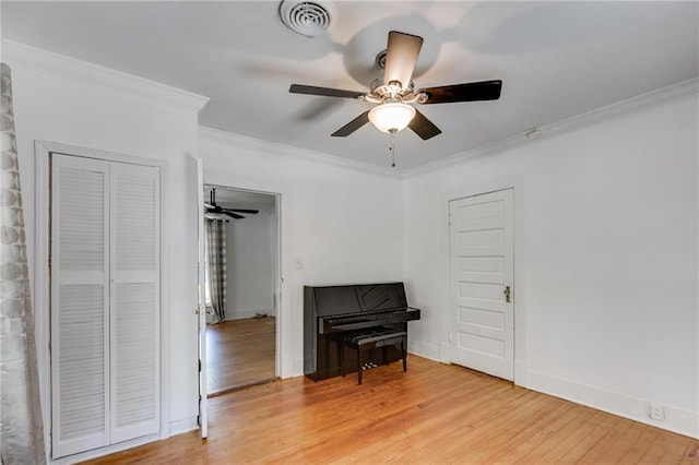 1405 May Ave SE, Atlanta, GA 30316 - living area with a ceiling fan, crown molding, light wood-type flooring, and baseboards