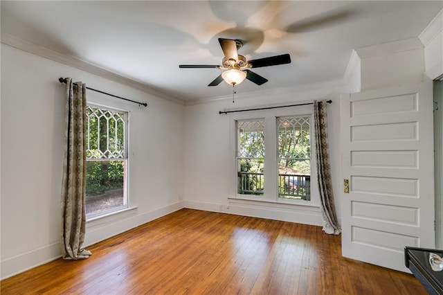 1405 May Ave SE, Atlanta, GA 30316 - empty room featuring healthy amount of natural light, crown molding, ceiling fan, wood-type flooring, and baseboards