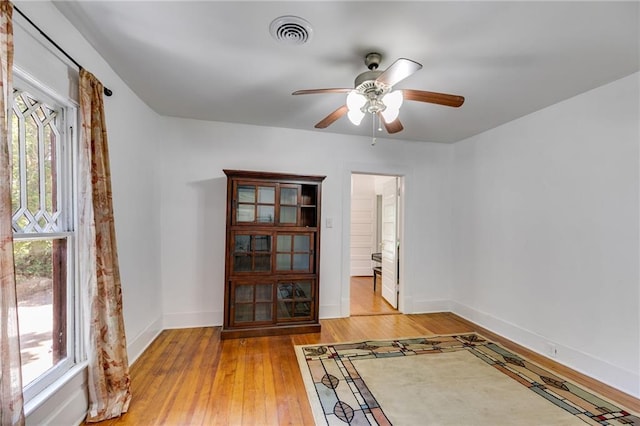 1405 May Ave SE, Atlanta, GA 30316 - spare room featuring healthy amount of natural light, light wood-style floors, ceiling fan, and baseboards
