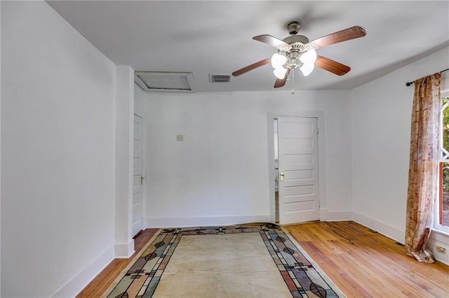 1405 May Ave SE, Atlanta, GA 30316 - spare room featuring attic access, wood finished floors, a ceiling fan, and baseboards