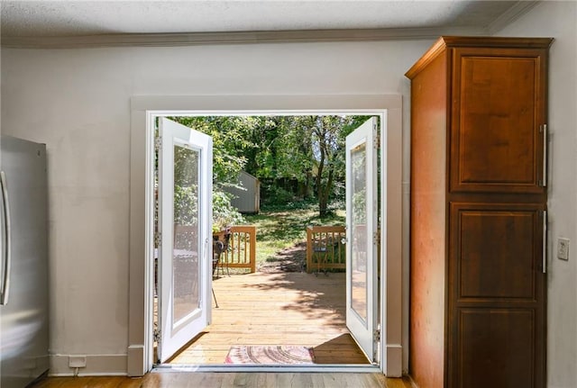 1405 May Ave SE, Atlanta, GA 30316 - entryway featuring light wood-type flooring and ornamental molding