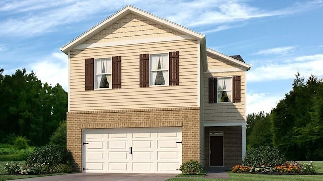 front of property featuring a front lawn and a garage