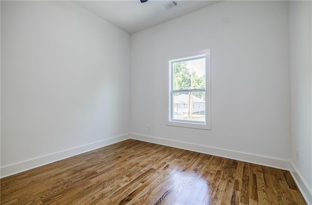 115 Dahlia Ave NW, Atlanta, GA 30314 - spare room featuring wood finished floors and baseboards