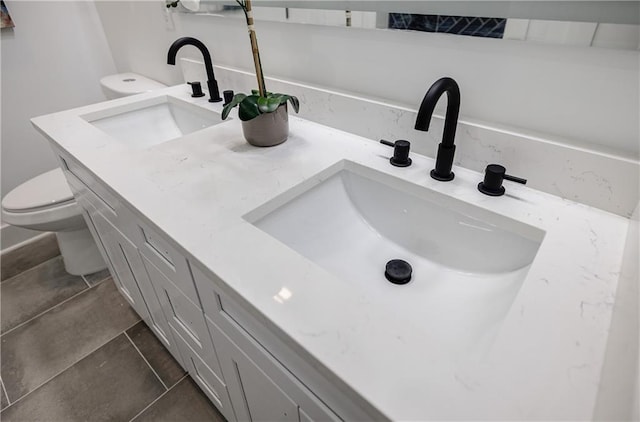 115 Dahlia Ave NW, Atlanta, GA 30314 - bathroom view of toilet and double vanity