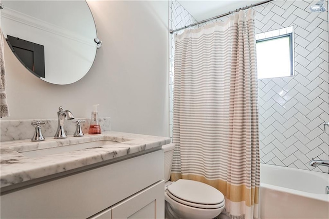 full bath with toilet, shower / tub combo, and vanity